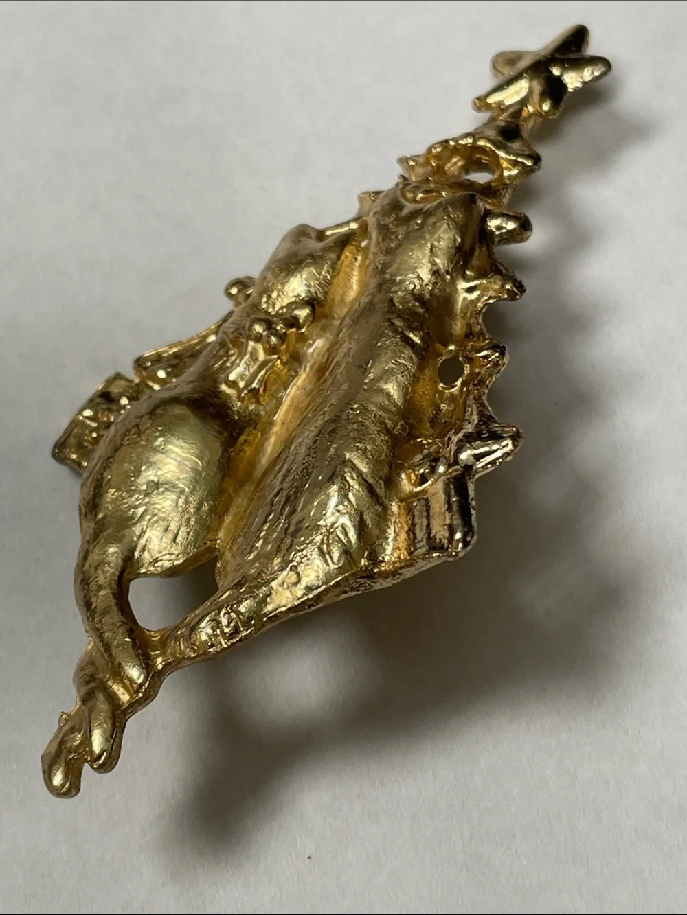 unmarked gold tone
